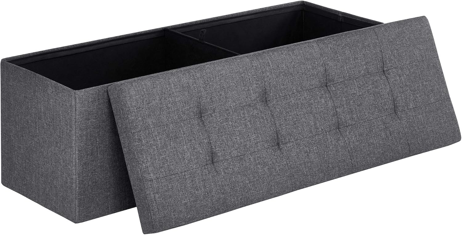 SONGMICS storage ottoman bench used as end-of-bed seating and foot rest in bedroom setting