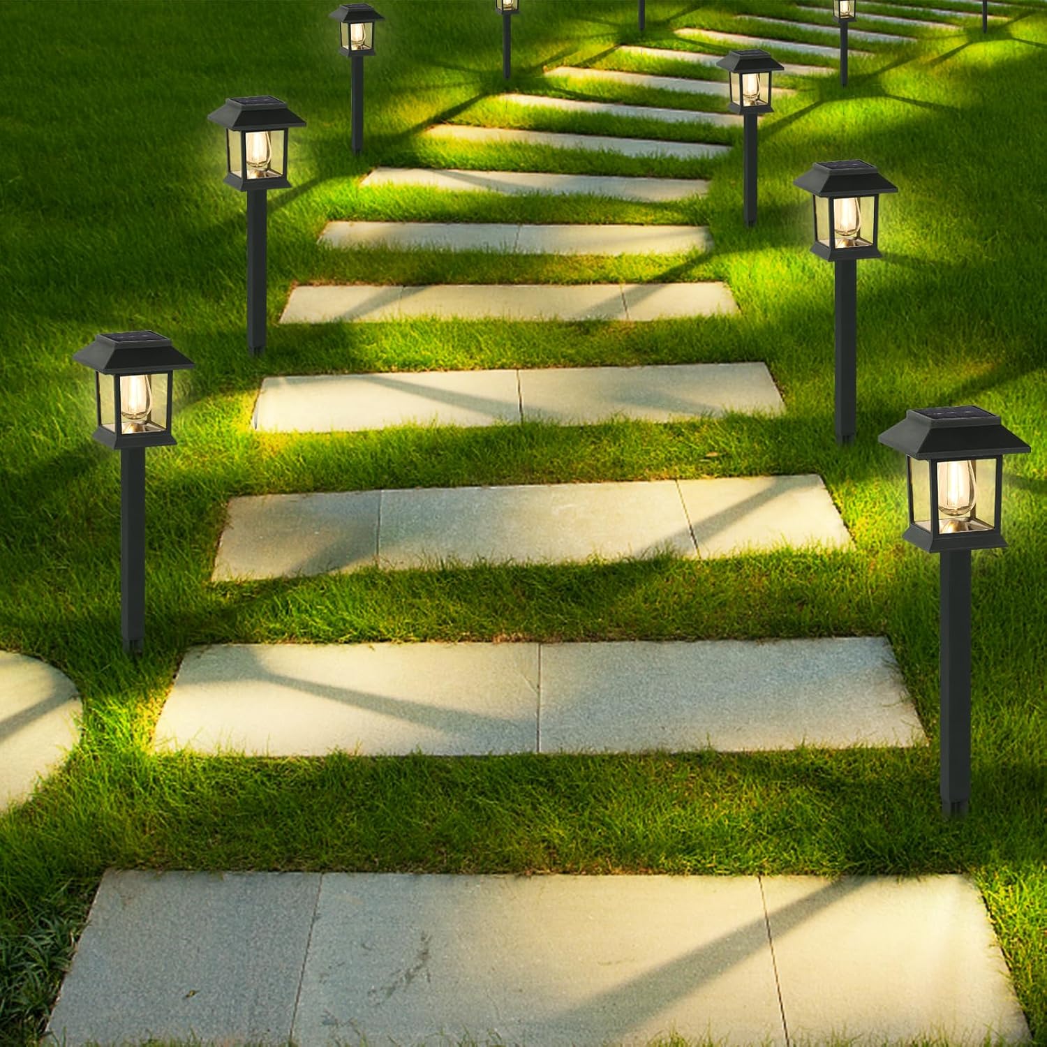 Waterproof solar lights lining driveway border for nighttime safety and curb appeal